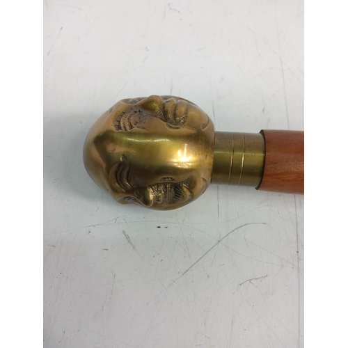 159 - 4-faced Buddha head topped walking stick