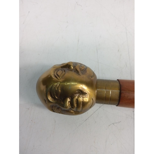 159 - 4-faced Buddha head topped walking stick