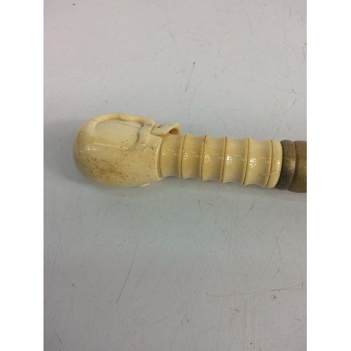 160 - Carved bone walking stick with skull top with moving jaw