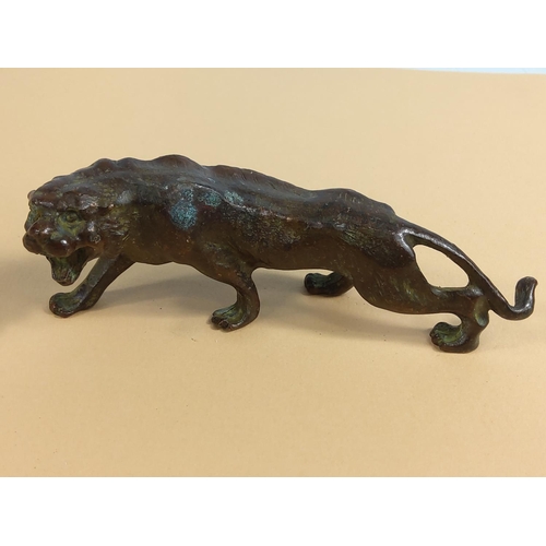 238 - Cast bronze tiger, 13cms in length