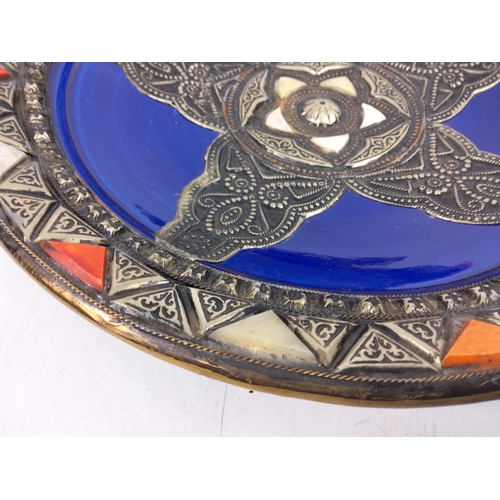 17 - Moroccan pottery plate with metal overlay, 36cms in diameter