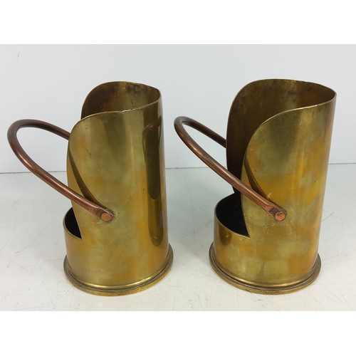 21 - 2 1916 trench art 13 pound shells in the form of coal scuttles, both 15cms in height