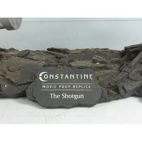 86 - Large boxed Constantine hand and gun statue