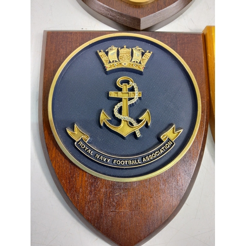 10 - 4 wooden mounted military insignia