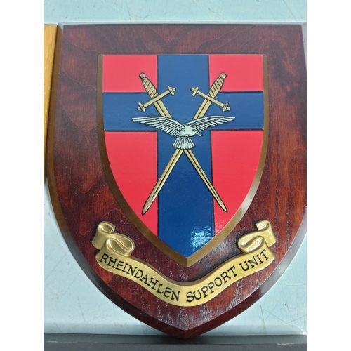 12 - 4 wooden mounted military insignia