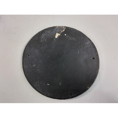 28 - Cast metal advertising sign, 21cms in diameter