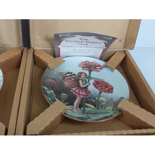 66 - 12 boxed collectors plates