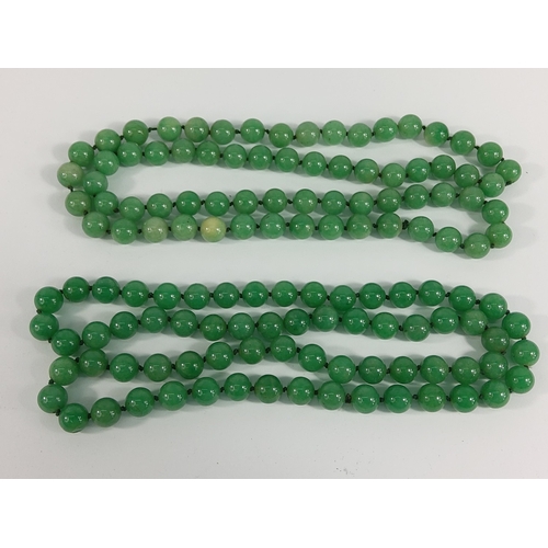 335 - 2 strings of jade green beads