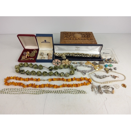 340 - Costume jewellery and a wooden box