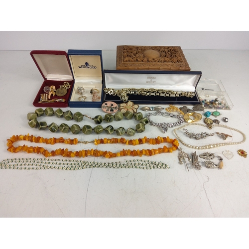 340 - Costume jewellery and a wooden box