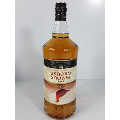 13 - Magnum bottle 1980's The Famous Grouse Whisky, 150cl, 40% and 1L 1970's Grand Marnier Triple Orange ... 