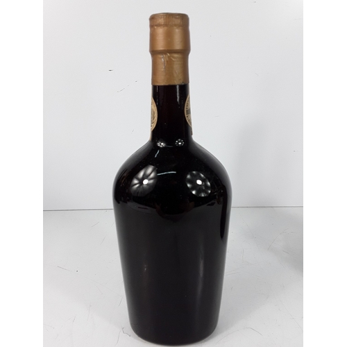 33 - One bottle Martinez Director's Port bottled 1964 and one bottle Ferreira Porto Blanco Lagrima