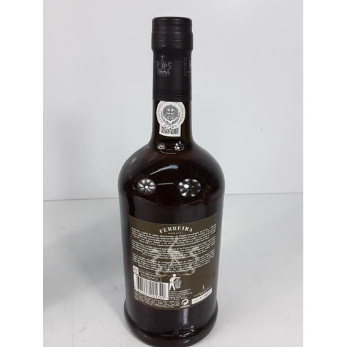 33 - One bottle Martinez Director's Port bottled 1964 and one bottle Ferreira Porto Blanco Lagrima