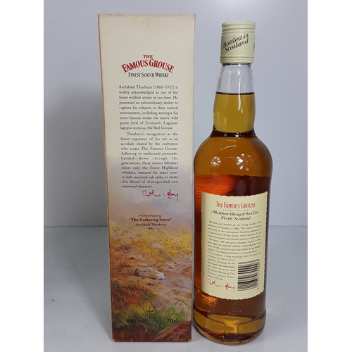 42 - One damaged boxed bottle of Cutty Sark whisky 25 fl.oz, 86 proof and one boxed The Famous Grouse, 70... 