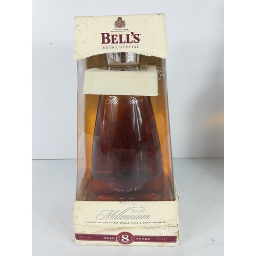 113 - Four bts,one Bell's Millennium 2000 aged 8 years,70cl,40%,one bt
Bell's Extra Special,75cl,40%,1980s... 