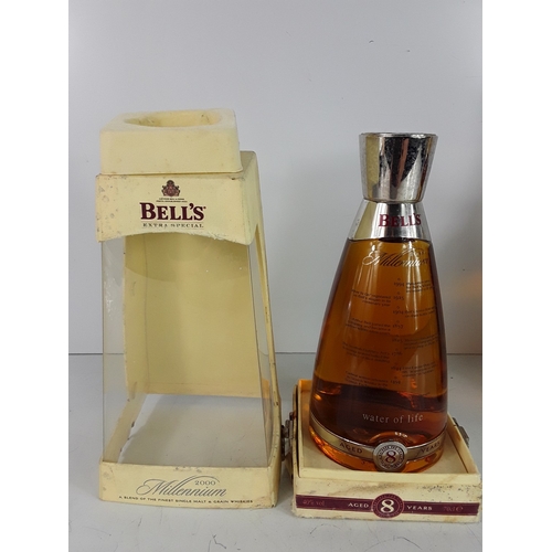 113 - Four bts,one Bell's Millennium 2000 aged 8 years,70cl,40%,one bt
Bell's Extra Special,75cl,40%,1980s... 