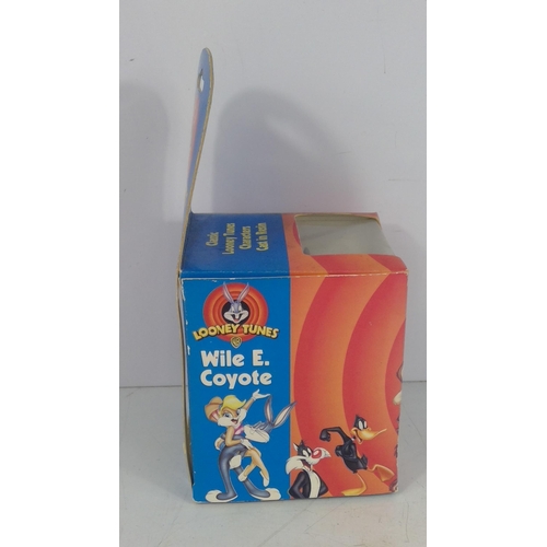 188 - Boxed Looney Tunes Wile.E Coyote and boxed knight