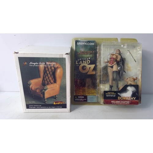 189 - Boxed Dorothy Twisted Land of Oz figurine and a model chair