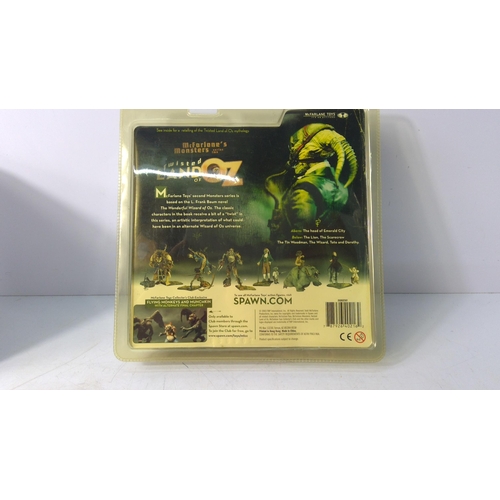 189 - Boxed Dorothy Twisted Land of Oz figurine and a model chair