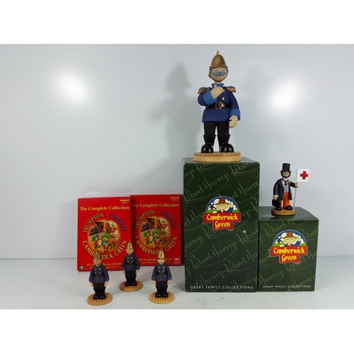 209 - Two boxed Camberwick Green figures, three loose, and two DVDs
