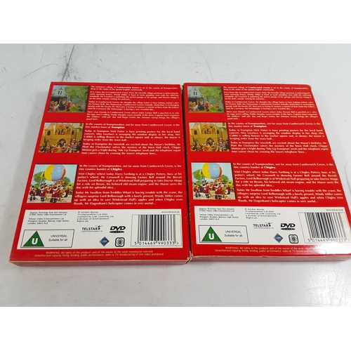 209 - Two boxed Camberwick Green figures, three loose, and two DVDs