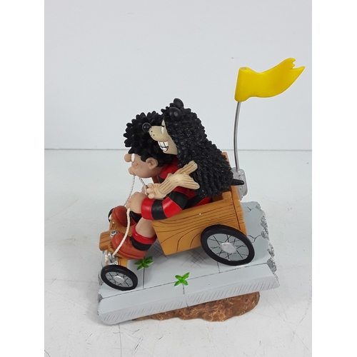 213 - One boxed Beano figure and two PG Tips