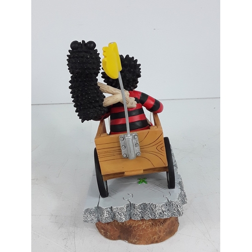 213 - One boxed Beano figure and two PG Tips