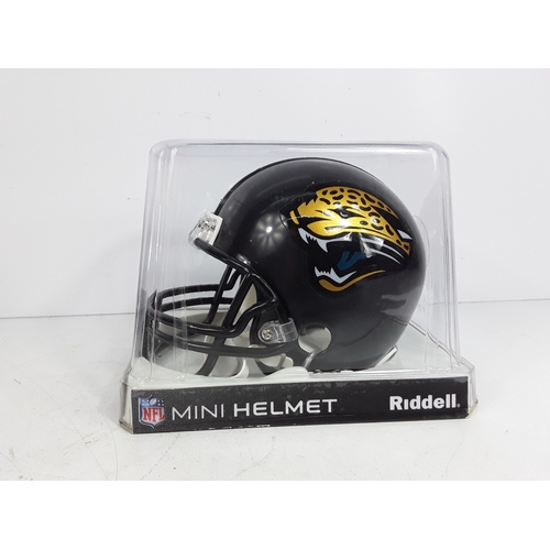 190 - Two NFL collectibles plus baseball mit