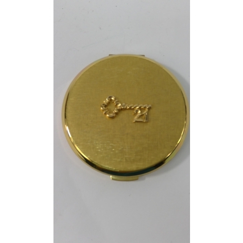 313 - An unused 1970's 21st Birthday compact and a compact with peacock design