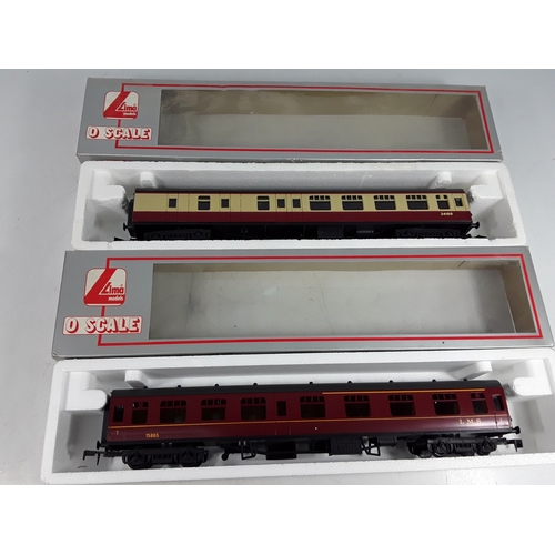 325 - Four boxed Lima 0 gauge carriages