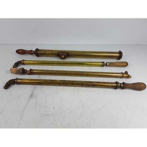 192 - Three brass pumps
