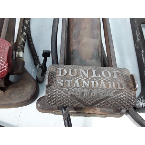 219 - 5 vintage foot pumps