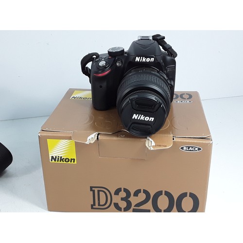 351 - Nikon camera and lens, Canon camera, CD players, and electricals