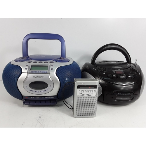 351 - Nikon camera and lens, Canon camera, CD players, and electricals