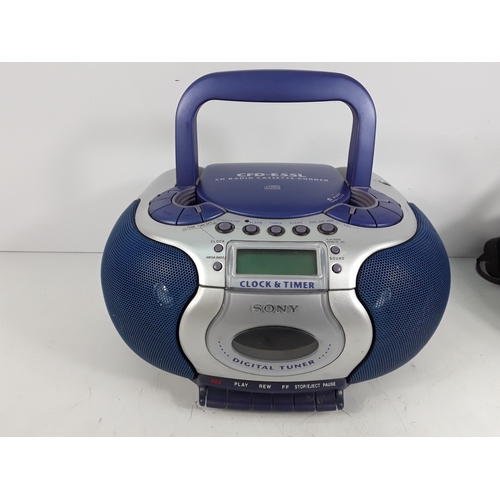 351 - Nikon camera and lens, Canon camera, CD players, and electricals