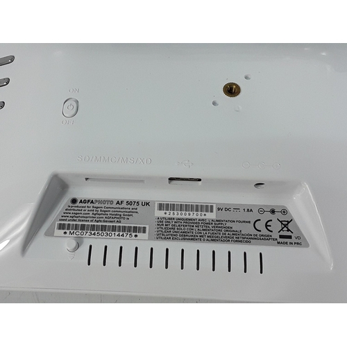 351 - Nikon camera and lens, Canon camera, CD players, and electricals