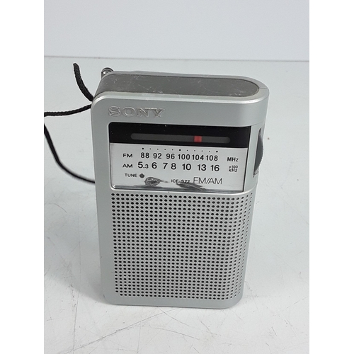 351 - Nikon camera and lens, Canon camera, CD players, and electricals