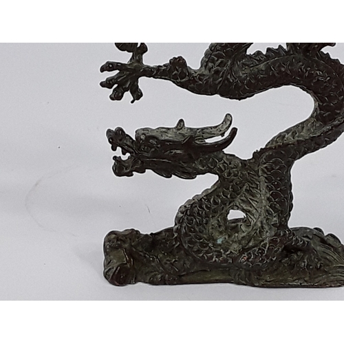 97 - Cast bronze dragon figure, 8 x 8cms