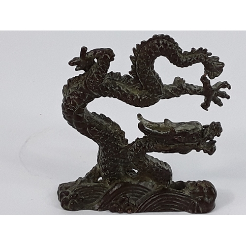97 - Cast bronze dragon figure, 8 x 8cms