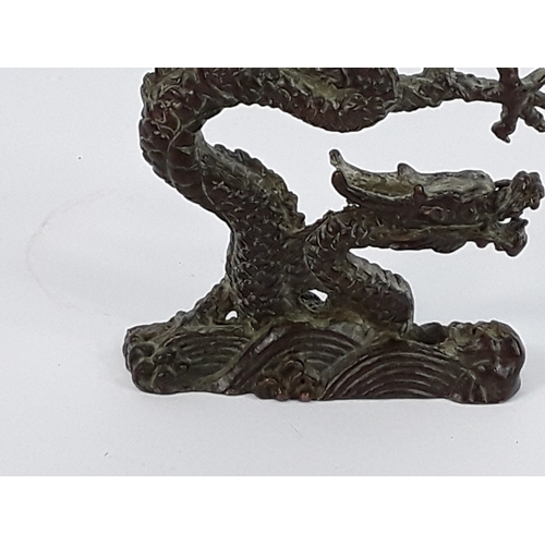 97 - Cast bronze dragon figure, 8 x 8cms