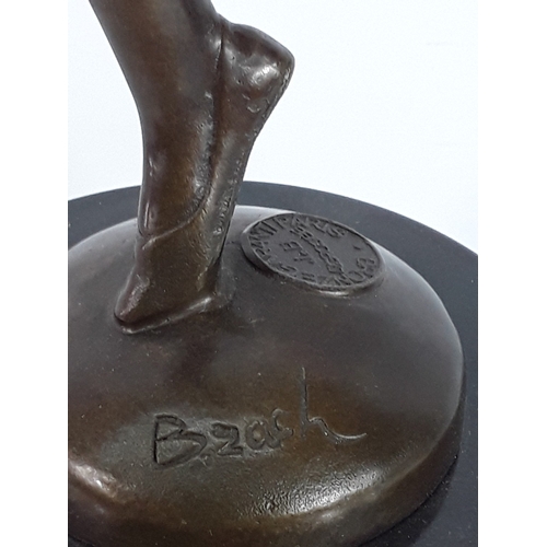 335 - Bronze dancing lady on marble base, 68cms in height