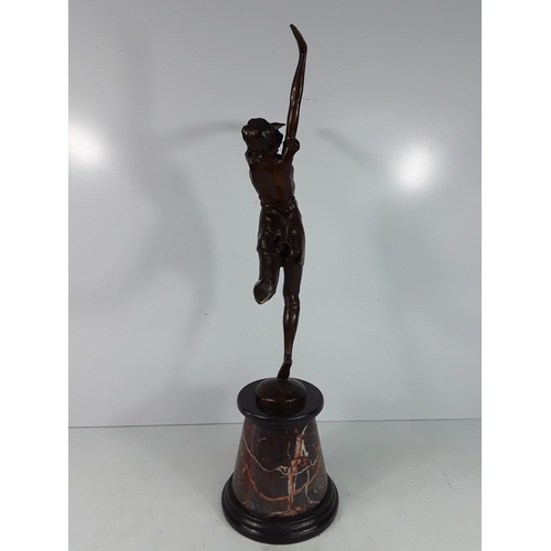 335 - Bronze dancing lady on marble base, 68cms in height