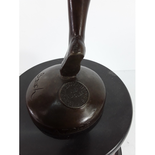 335 - Bronze dancing lady on marble base, 68cms in height