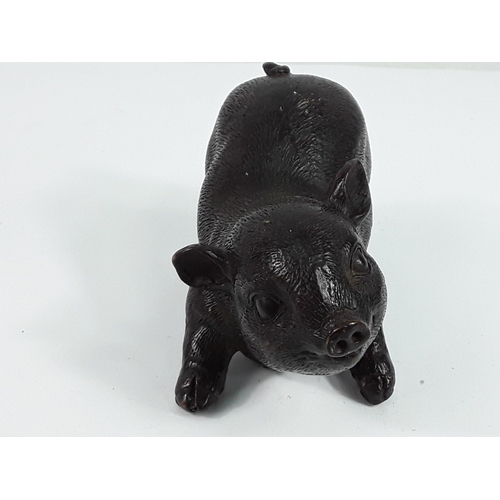340 - Cast Bronze pig, 12 x 8cms