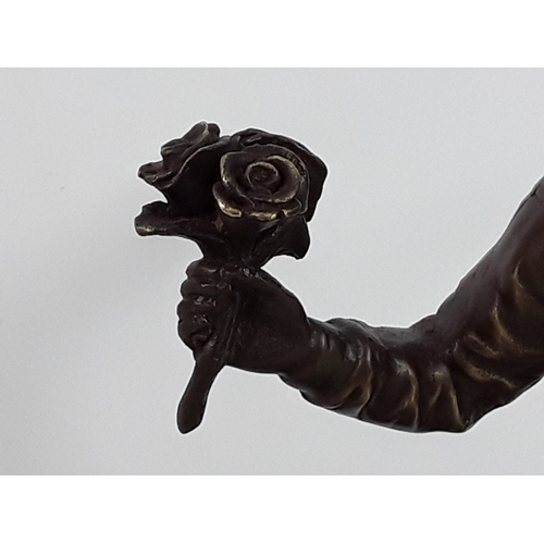 349 - Banksy style bronze on marble base - man with flowers, 25 x 22 x 12cms