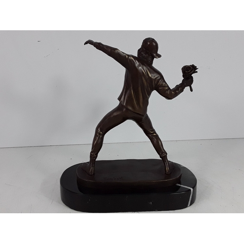 349 - Banksy style bronze on marble base - man with flowers, 25 x 22 x 12cms