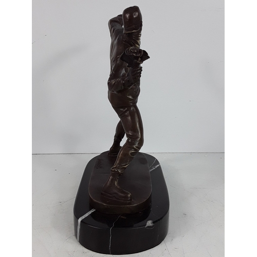 349 - Banksy style bronze on marble base - man with flowers, 25 x 22 x 12cms