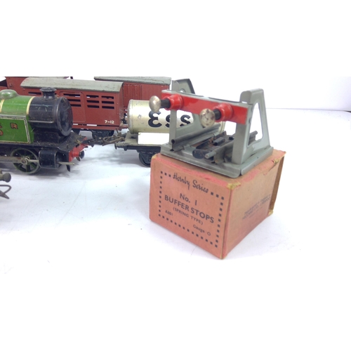 321 - Large selection of various carriages and rolling stock, mainly 0 gauge