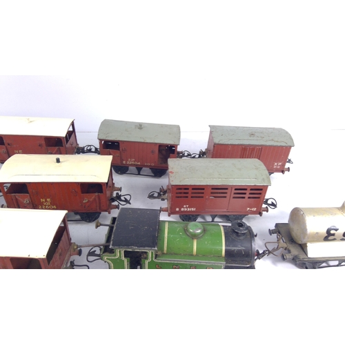 321 - Large selection of various carriages and rolling stock, mainly 0 gauge