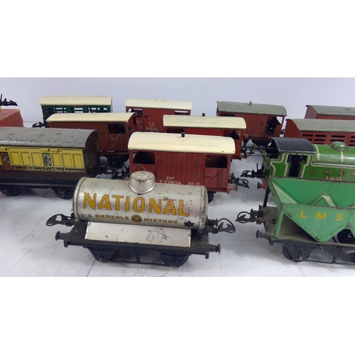 321 - Large selection of various carriages and rolling stock, mainly 0 gauge